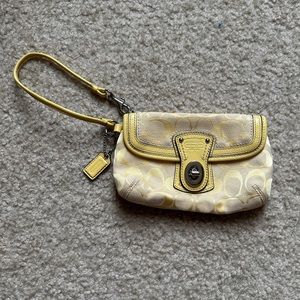 Small yellow Coach purse